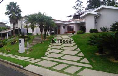 Imagem: A casa em condomínio possui 4 Dormitórios, 5 Banheiros, 4