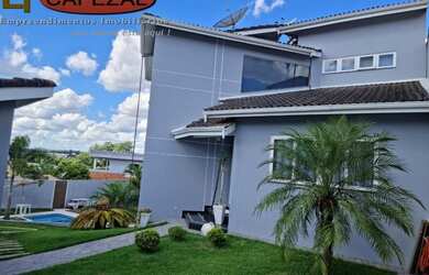 Imagem: A casa possui 3 Dormitórios, 3 Banheiros, 2 Vagas na garagem