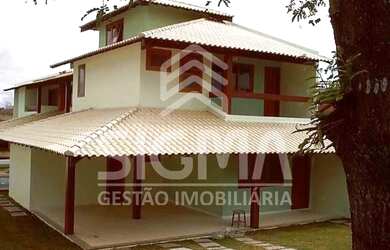 Imagem: A casa possui 3 Dormitórios, 3 Banheiros, 4 Vagas na garagem