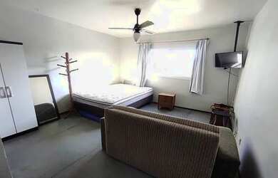 Imagem: A kitnet possui 1 Dormitório, 1 Banheiro, 1 Vaga na garagem