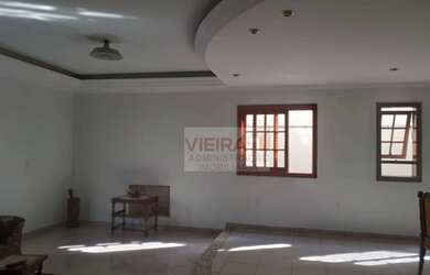 Imagem: A casa possui 3 Dormitórios, 5 Banheiros, 4 Vagas na garagem