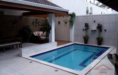 Imagem: A casa em condomínio possui 4 Dormitórios, 5 Banheiros, 4