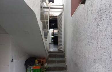 Imagem: A casa possui 3 Dormitórios, 2 Banheiros, 2 Vagas na garagem