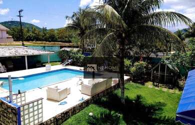 Imagem: A casa em condomínio possui 5 Dormitórios, 5 Banheiros, 5