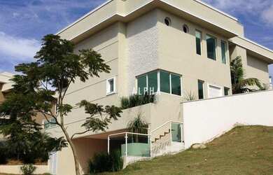 Imagem: A casa em condomínio possui 4 Dormitórios, 5 Banheiros, 5