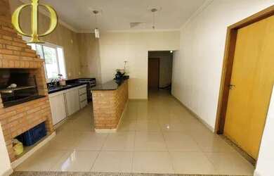 Imagem: A casa possui 3 Dormitórios, 5 Banheiros, 4 Vagas na garagem