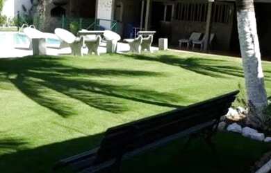 Imagem: A casa possui 5 Dormitórios e 5 Vagas na garagem e está localizado