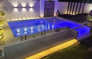 Imagem: A casa possui 3 Dormitórios, 5 Banheiros, 2 Vagas na garagem