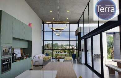 Imagem: A casa em condomínio possui 4 Dormitórios, 5 Banheiros, 5