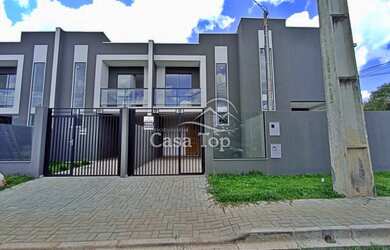 Imagem: A casa possui 2 Dormitórios, 1 Banheiro, 2 Vagas na garagem