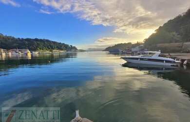 Imagem: A casa possui 5 Dormitórios, 5 Banheiros, 3 Vagas na garagem