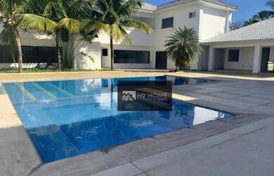 Imagem: A casa em condomínio possui 5 Dormitórios, 5 Banheiros, 5