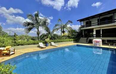 Imagem: A casa em condomínio possui 5 Dormitórios, 5 Banheiros, 5