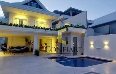 Imagem: A casa em condomínio possui 4 Dormitórios, 5 Banheiros, 340m²