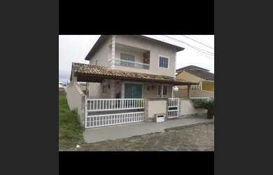 Imagem: A casa possui 5 Dormitórios, 2 Vagas na garagem e está localizado