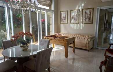 Imagem: A casa em condomínio à venda possui 3 Dormitórios, 5 Banheiros