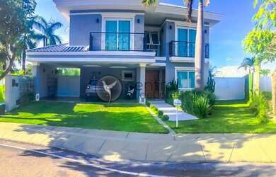 Imagem: A casa possui 5 Dormitórios, 5 Banheiros, 5 Vagas na garagem