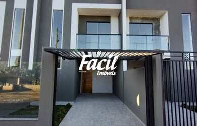 Imagem: A casa possui 2 Dormitórios, 1 Banheiro, 2 Vagas na garagem