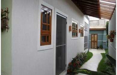 Imagem: A casa em condomínio possui 3 Dormitórios, 3 Banheiros, 600m²