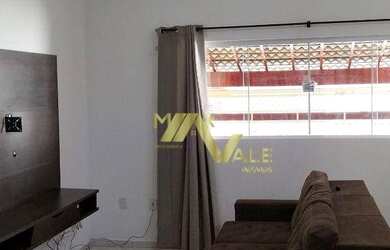 Imagem: A casa possui 2 Dormitórios, 4 Banheiros, 2 Vagas na garagem