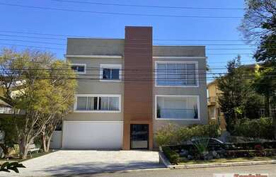 Imagem: A casa em condomínio possui 5 Dormitórios, 5 Banheiros, 4