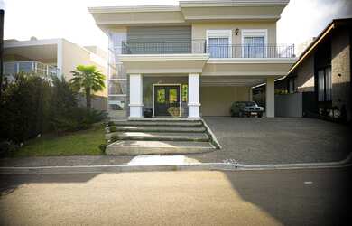 Imagem: A casa em condomínio possui 1 Dormitório, 1 Banheiro, 2 Vagas