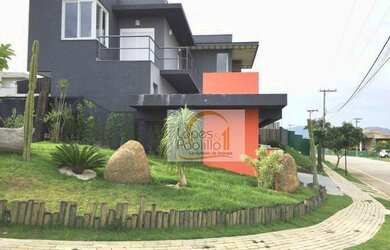 Imagem: A casa em condomínio possui 4 Dormitórios, 5 Banheiros, 3