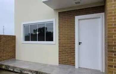 Imagem: A casa possui 2 Dormitórios, 2 Banheiros, 1 Vaga na garagem