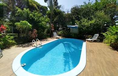 Imagem: A casa em condomínio possui 5 Dormitórios, 5 Banheiros, 5