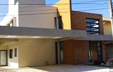 Imagem: A casa possui 4 Dormitórios, 5 Banheiros, 3 Vagas na garagem