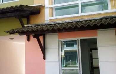 Imagem: A casa possui 2 Dormitórios e 2 Banheiros e está localizado