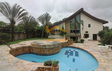 Imagem: A casa em condomínio possui 3 Dormitórios, 5 Banheiros e 500m²