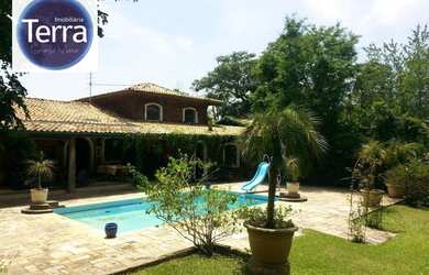 Imagem: A casa em condomínio possui 4 Dormitórios, 5 Banheiros, 4