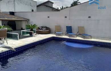 Imagem: A casa possui 3 Dormitórios, 3 Banheiros, 3 Vagas na garagem