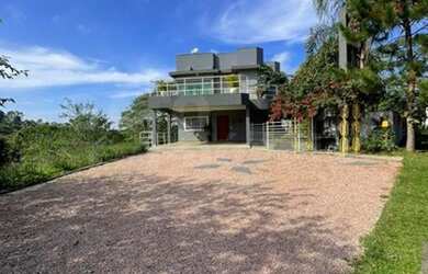 Imagem: A casa em condomínio possui 3 Dormitórios, 4 Banheiros, 5