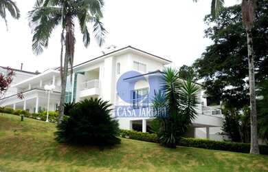 Imagem: A casa em condomínio possui 4 Dormitórios, 4 Banheiros, 5