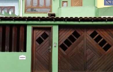 Imagem: A casa possui 3 Dormitórios, 3 Banheiros, 1 Vaga na garagem