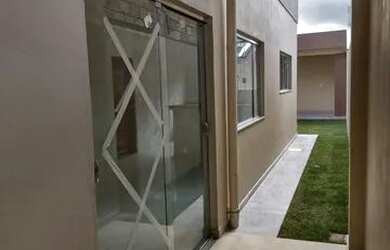 Imagem: A casa possui 3 Dormitórios, 3 Banheiros e 2 Vagas na garagem