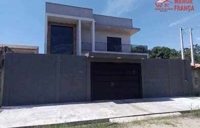 Imagem: A casa possui 3 Dormitórios, 1 Banheiro, 2 Vagas na garagem