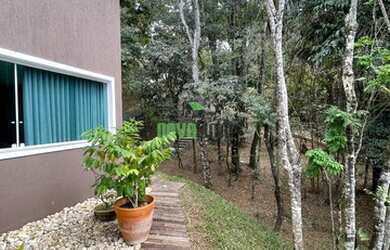 Imagem: A casa em condomínio possui 4 Dormitórios, 5 Banheiros, 5