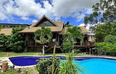 Imagem: A casa em condomínio possui 4 Dormitórios, 5 Banheiros, 2