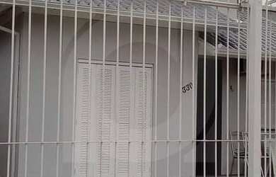 Imagem: A casa possui 4 Dormitórios, 3 Banheiros, 133m² de Área e