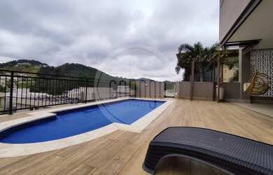 Imagem: A casa em condomínio possui 5 Dormitórios, 5 Banheiros, 4