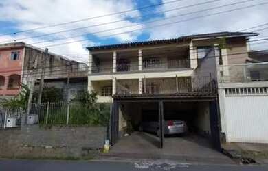 Imagem: A casa possui 4 Dormitórios, 3 Banheiros, 2 Vagas na garagem