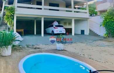 Imagem: A casa possui 5 Dormitórios, 5 Banheiros, 5 Vagas na garagem