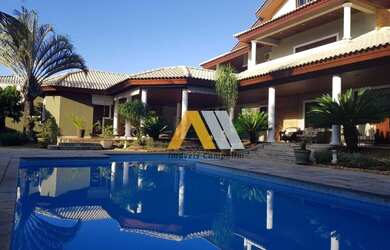 Imagem: A casa em condomínio possui 4 Dormitórios, 2 Banheiros e 600m²