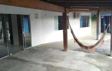 Imagem: A casa possui 3 Dormitórios, 3 Banheiros, 3 Vagas na garagem