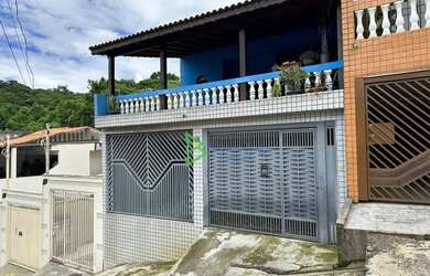 Imagem: A casa possui 3 Dormitórios, 3 Banheiros, 3 Vagas na garagem