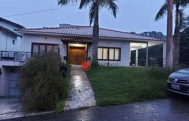 Imagem: A casa em condomínio possui 5 Dormitórios, 5 Banheiros, 5