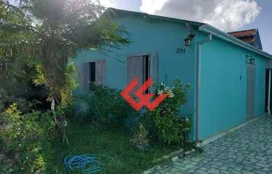 Imagem: A casa possui 3 Dormitórios, 2 Banheiros, 2 Vagas na garagem